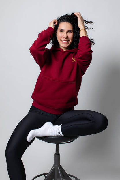 SILA Hudica by SILA, lightweight and breathable fabric, showing a close-up of the hooded garment with neutral color and soft texture.