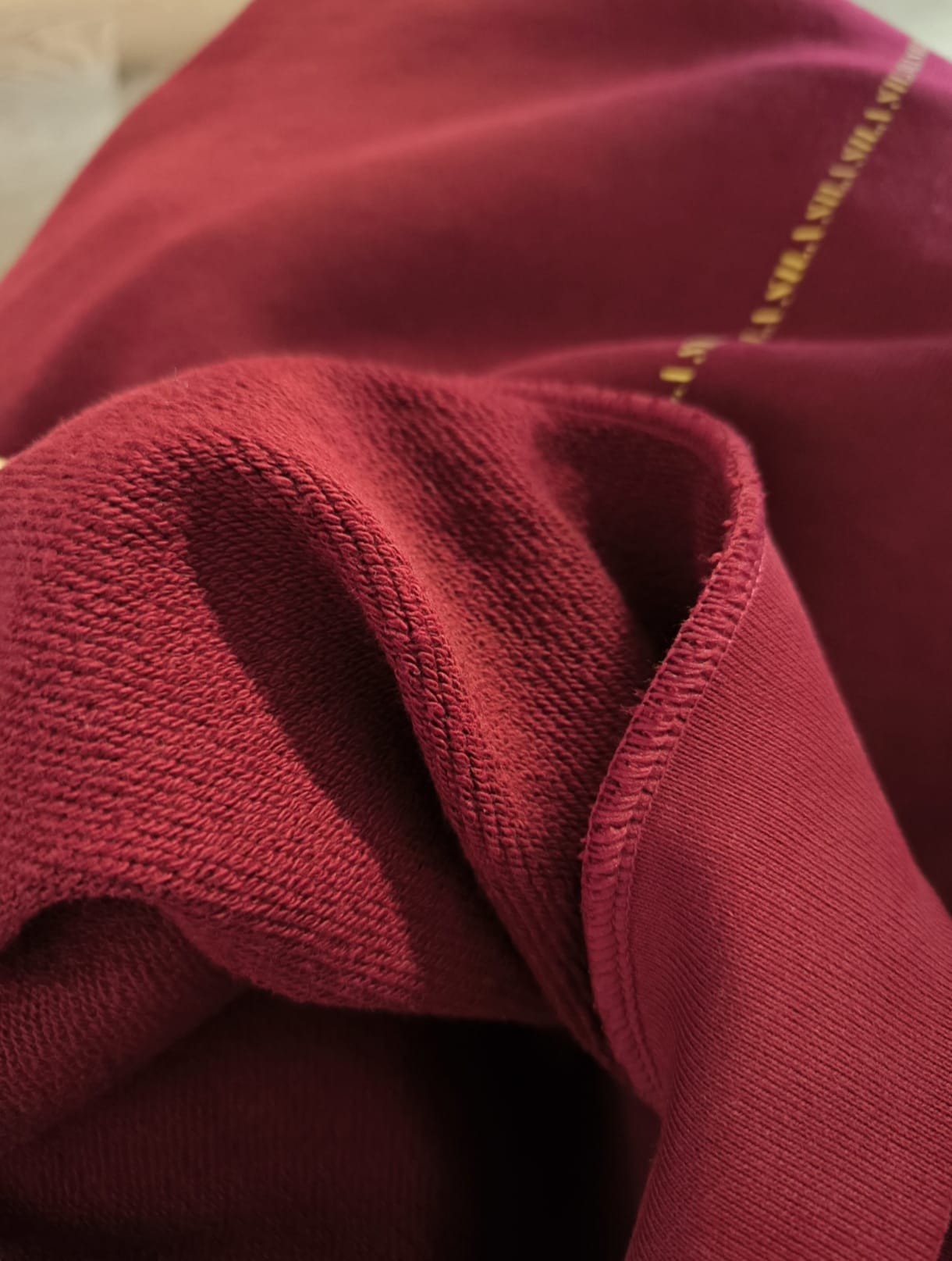 Close-up of SILA Hudica showing the material and fabric details, highlighting the texture and quality of the head covering.