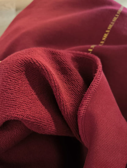 Close-up of SILA Hudica showing the material and fabric details, highlighting the texture and quality of the head covering.